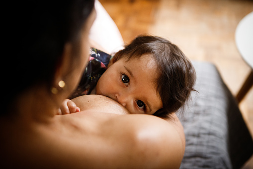 Mother breastfeeding her baby